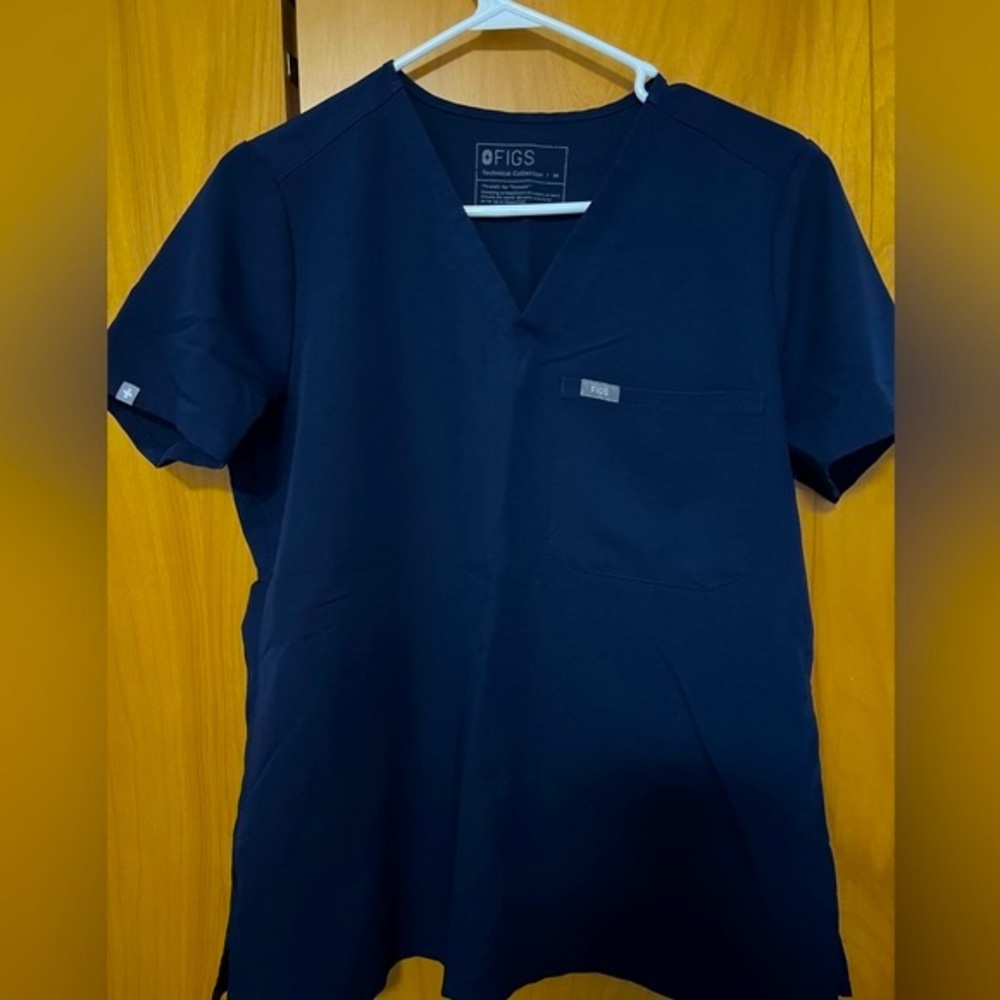 Figs. Women’s Navy one pocket Catarina top.